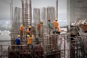 Depositphotos 26932425 Stock Photo Building Under Construction With Workers 300x200