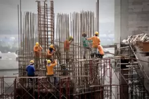 Depositphotos 26932425 Stock Photo Building Under Construction With Workers